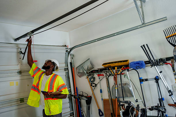 Professional Garage Door technician working in St. John, IN